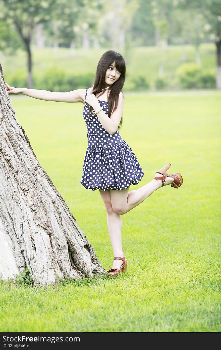 Asia girl relaxing outdoor in summer.