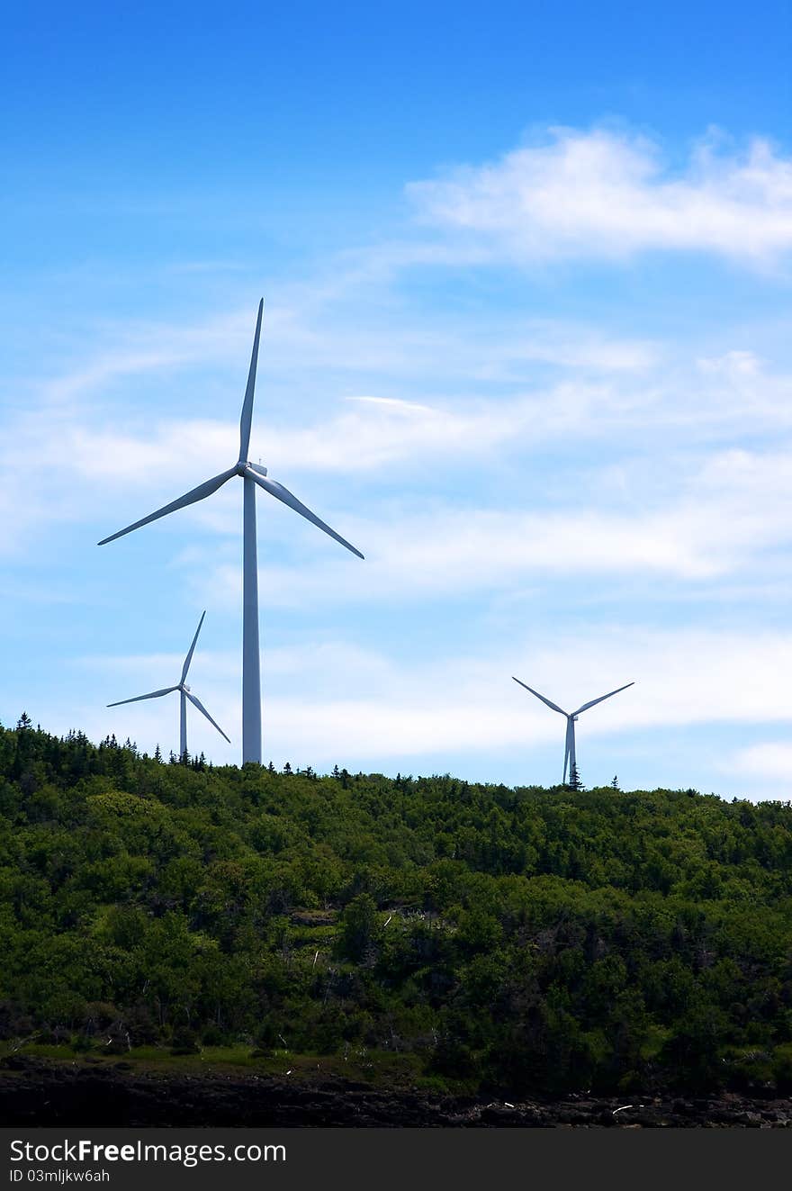 Wind turbines generate green energy at a windfarm. Wind turbines generate green energy at a windfarm