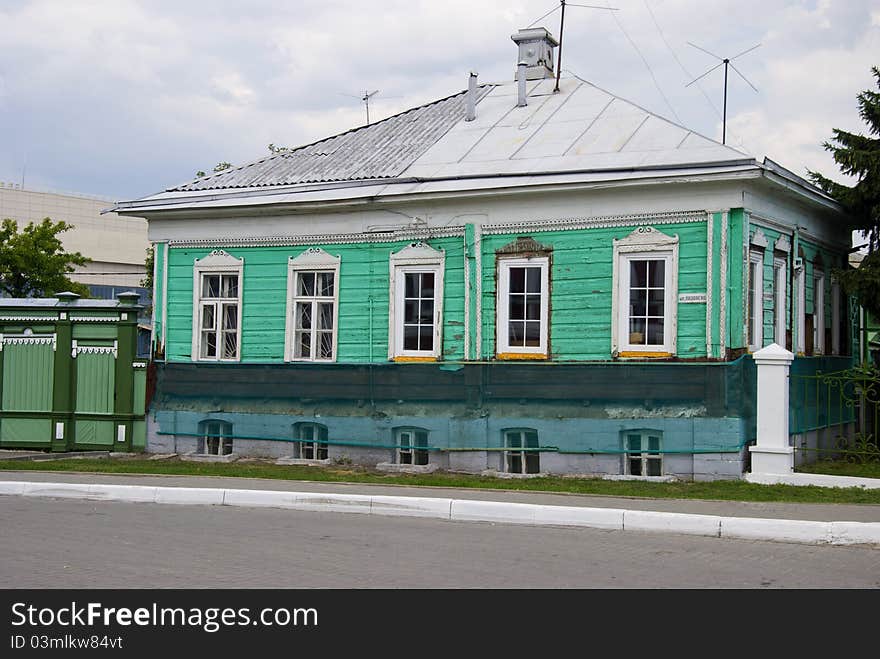 Restored wooden house and fence in the town of Kolomna. Restored wooden house and fence in the town of Kolomna.