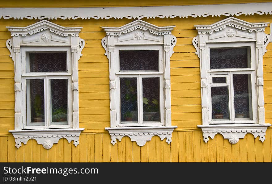 Restored wooden house and fence in the town of Kolomna. Restored wooden house and fence in the town of Kolomna.