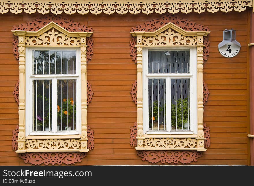 Restored wooden house and fence in the town of Kolomna. Restored wooden house and fence in the town of Kolomna.