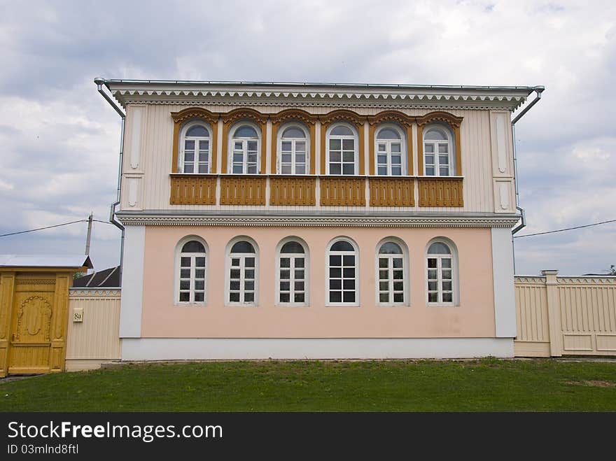 Restored wooden house and fence in the town of Kolomna. Restored wooden house and fence in the town of Kolomna.