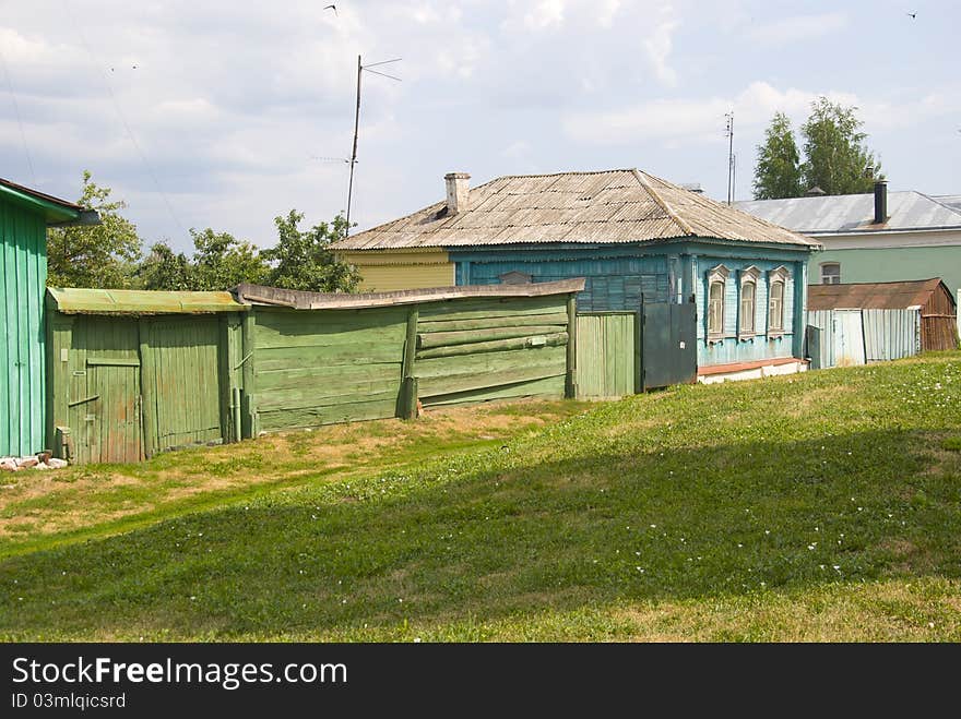 Restored wooden house and fence in the town of Kolomna. Restored wooden house and fence in the town of Kolomna.