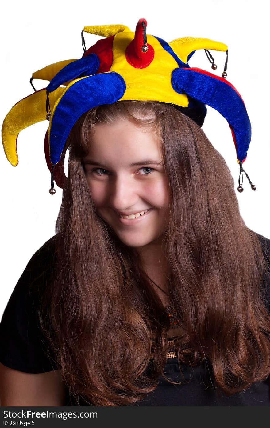 Girl in clown hat on a white background