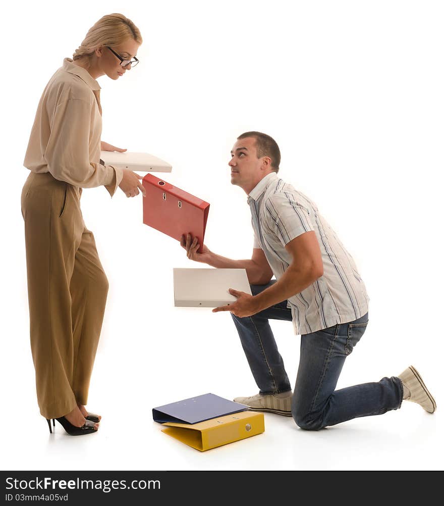 Man Helping Woman To Pickup Binders From Ground