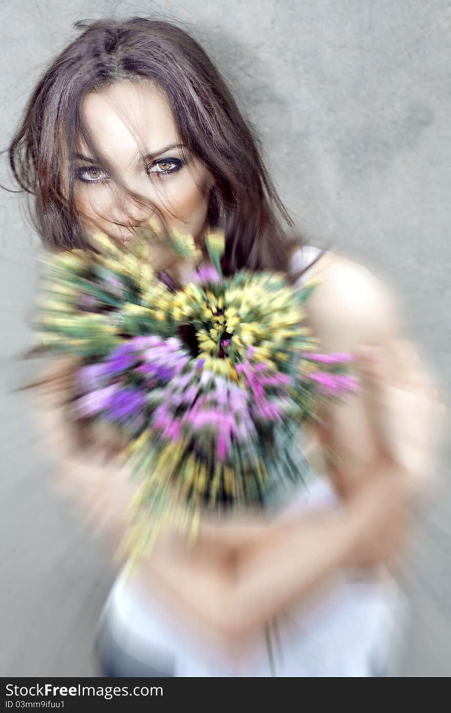 Beautiful girl and wildflowers