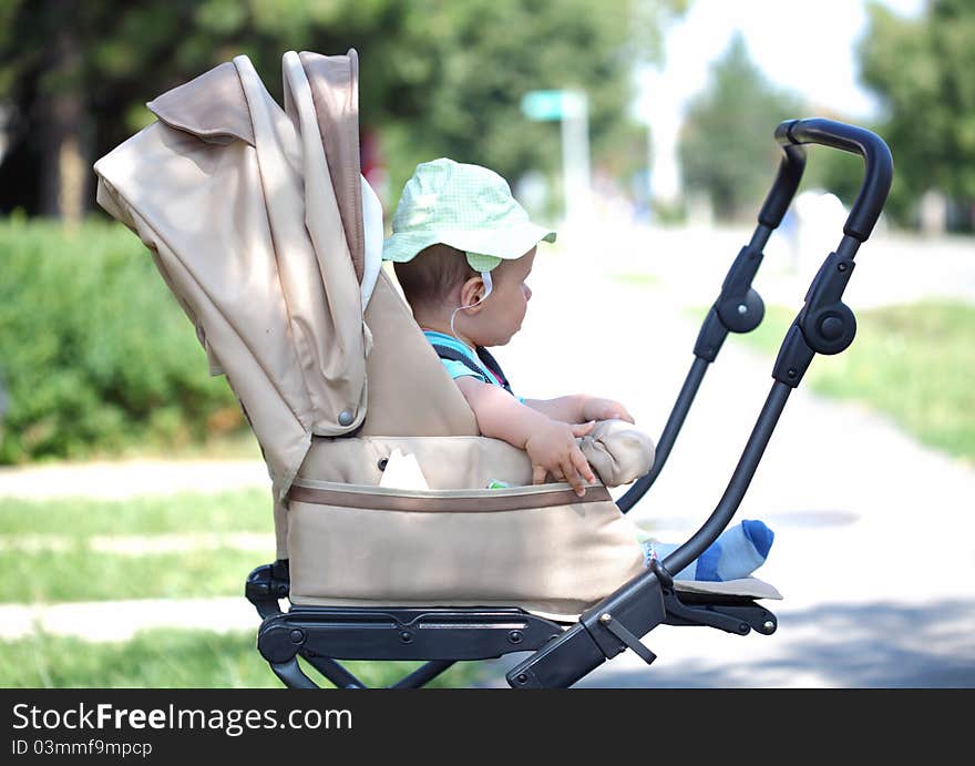 Baby in sitting stroller