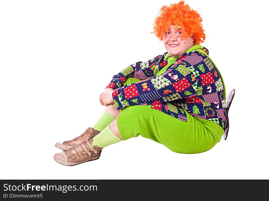 A man dressed Carlson, a clown with a propeller. White background. Studio photography. A man dressed Carlson, a clown with a propeller. White background. Studio photography.