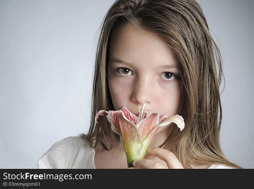 Teenager Smelling Flower