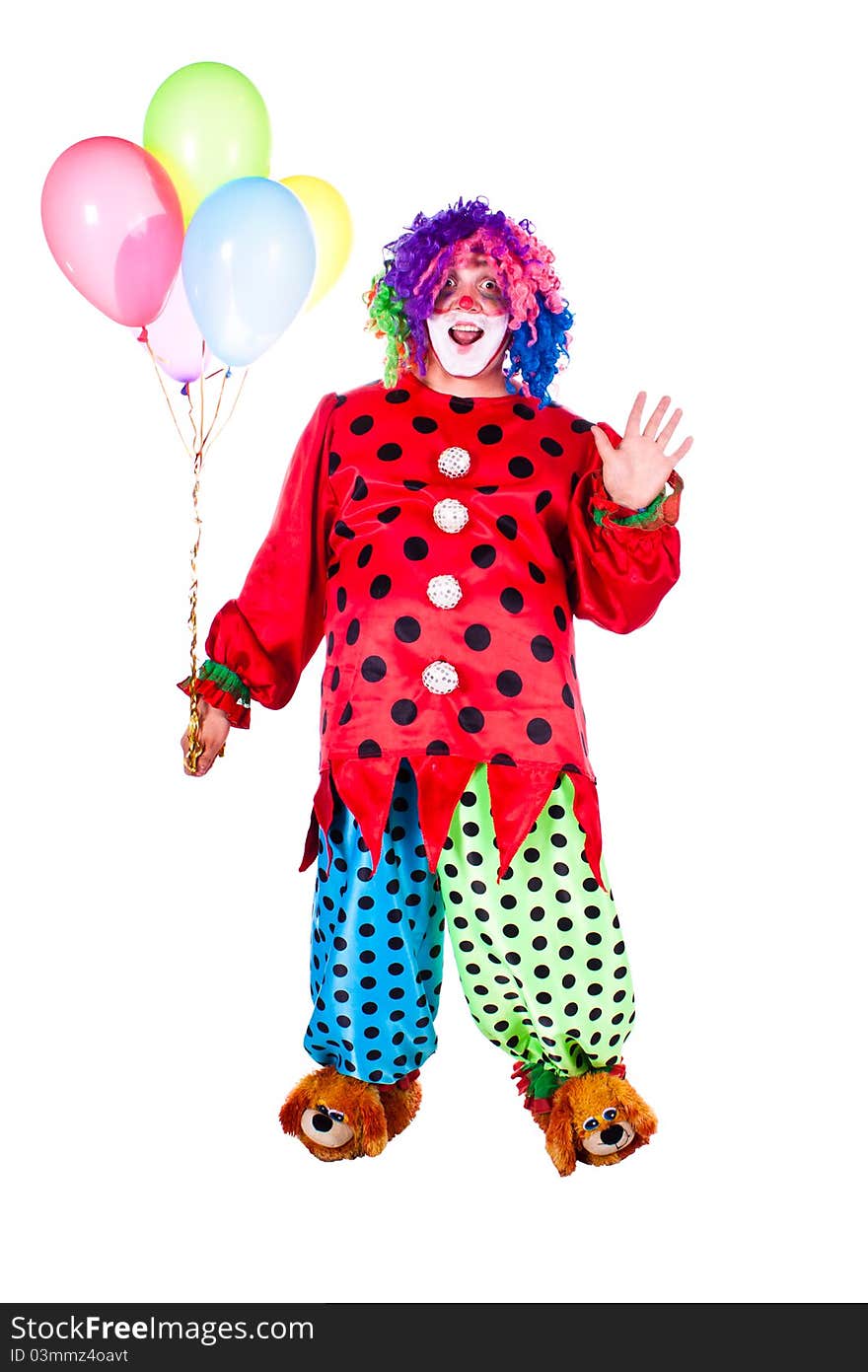 Man dressed as clown red. White background. Studio photography. Man dressed as clown red. White background. Studio photography.