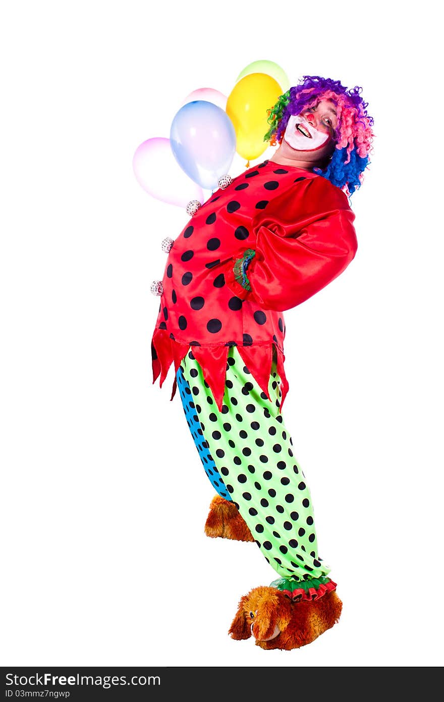 Man dressed as clown red. White background. Studio photography. Man dressed as clown red. White background. Studio photography.