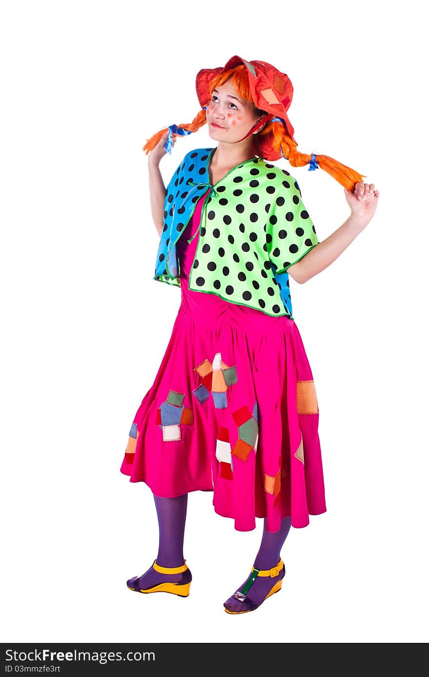 A girl dressed as a clown red. White background. Studio photography. A girl dressed as a clown red. White background. Studio photography.