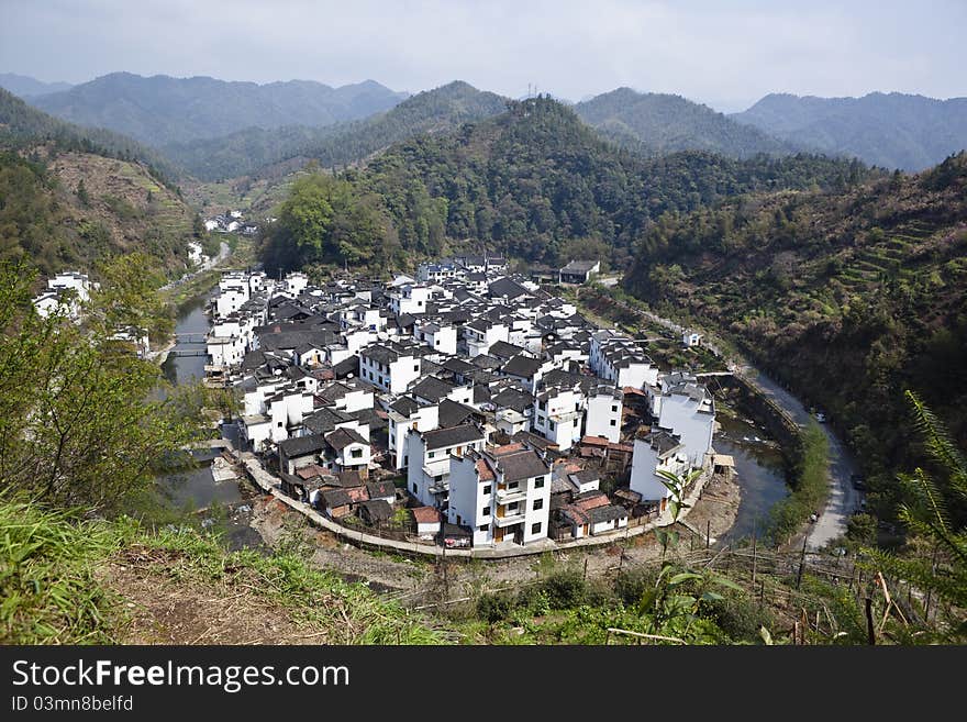 High angle view of jujing village built around the turn of a creek in wuyuan county, jiangxi province, china. High angle view of jujing village built around the turn of a creek in wuyuan county, jiangxi province, china.