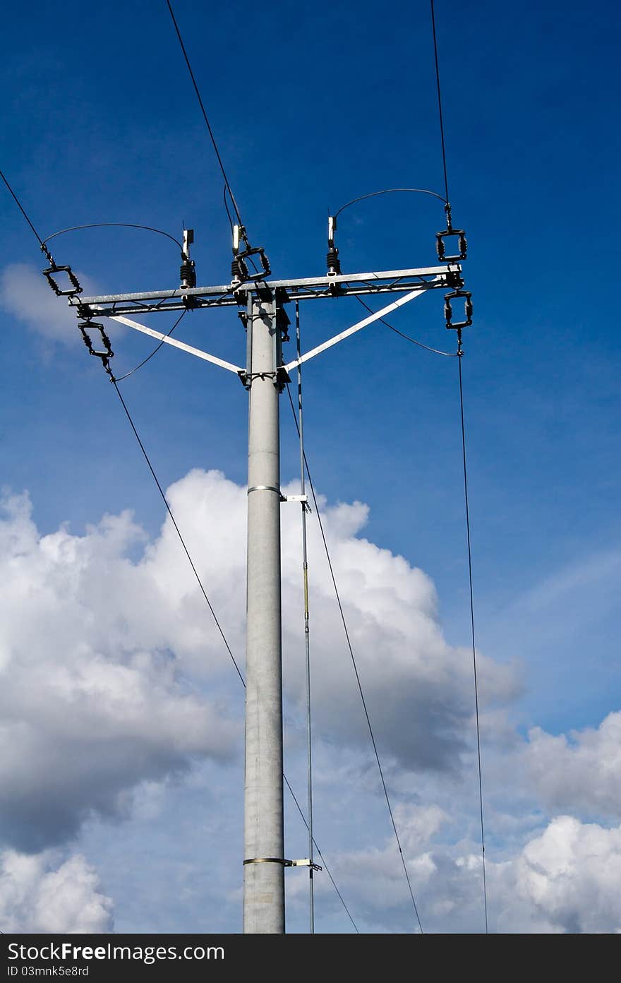 Electric pole and clouds