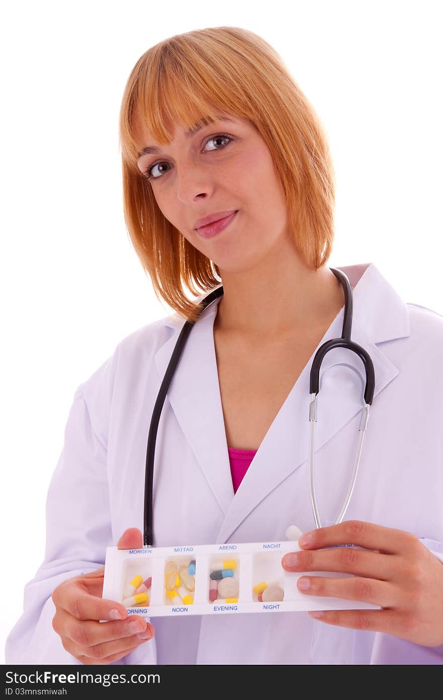 The young doctor with a tablet-box in her hand. The young doctor with a tablet-box in her hand