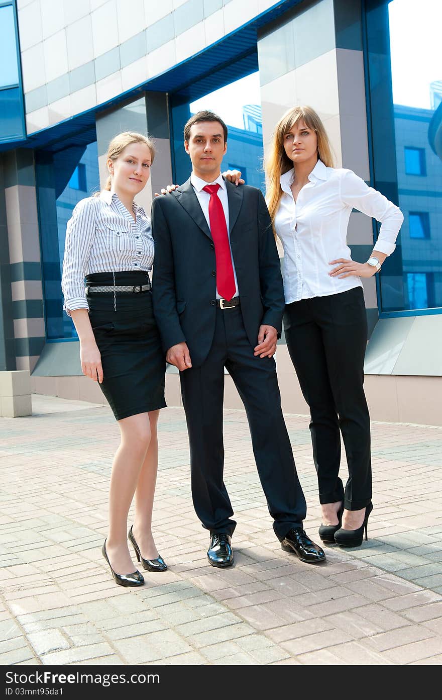 Business people group posing in modern downtown