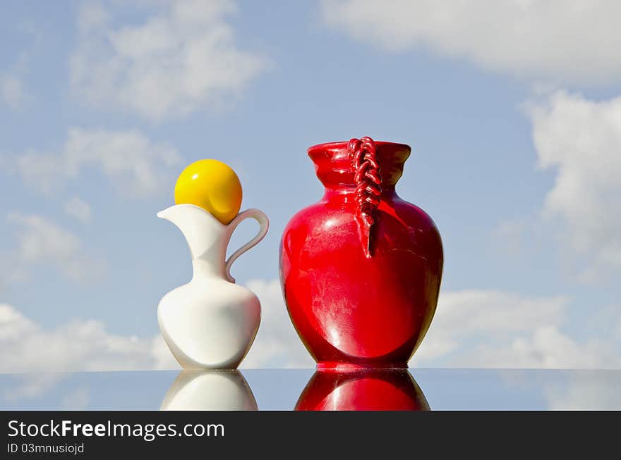 Two Pitchers On Mirror