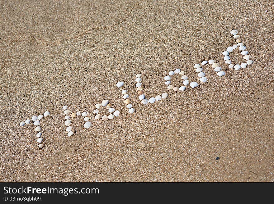 Thailand, seashells written on the sand. Thailand, seashells written on the sand