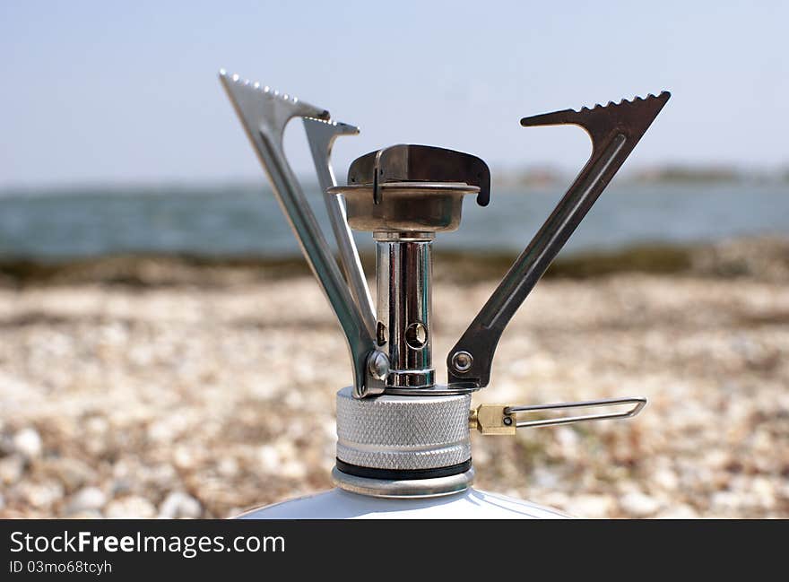 Portable outdoor gas stove for tourists and travelers