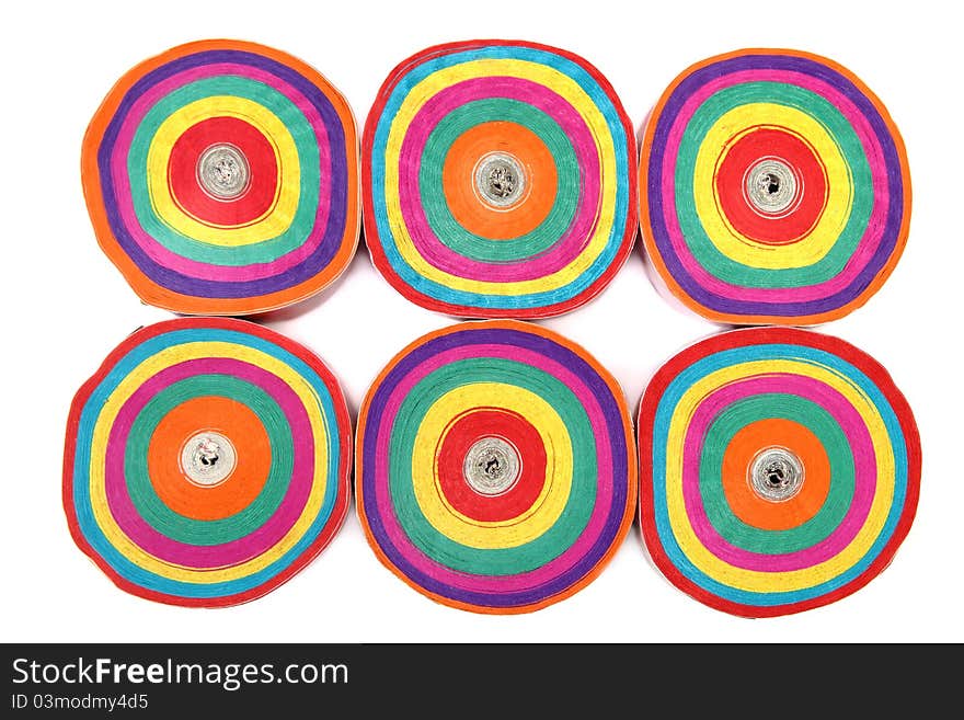 Bright colored rolls of festive paper confetti isolated on white. Bright colored rolls of festive paper confetti isolated on white