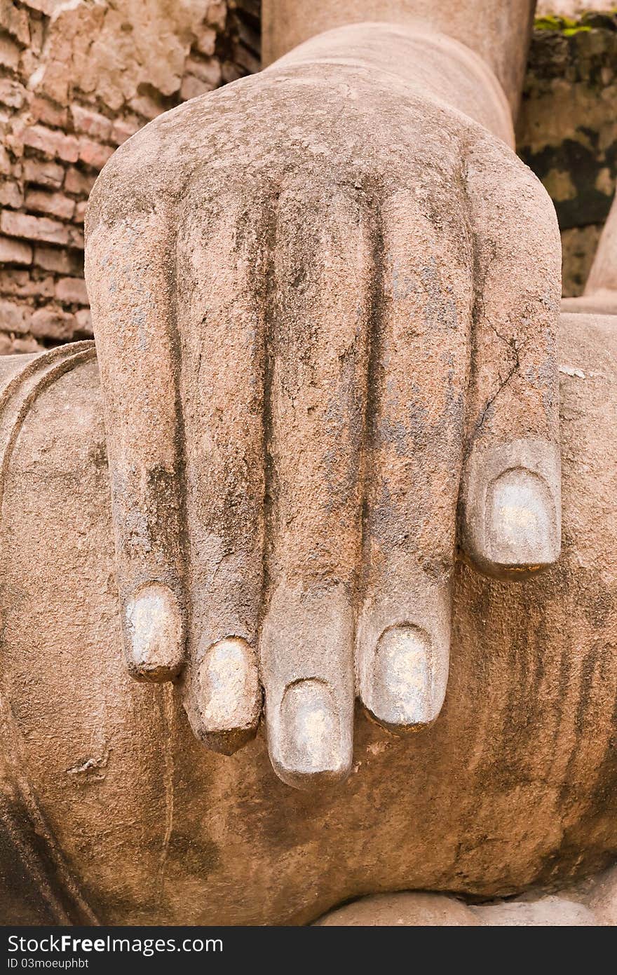 Hand of Buddha statue vertical