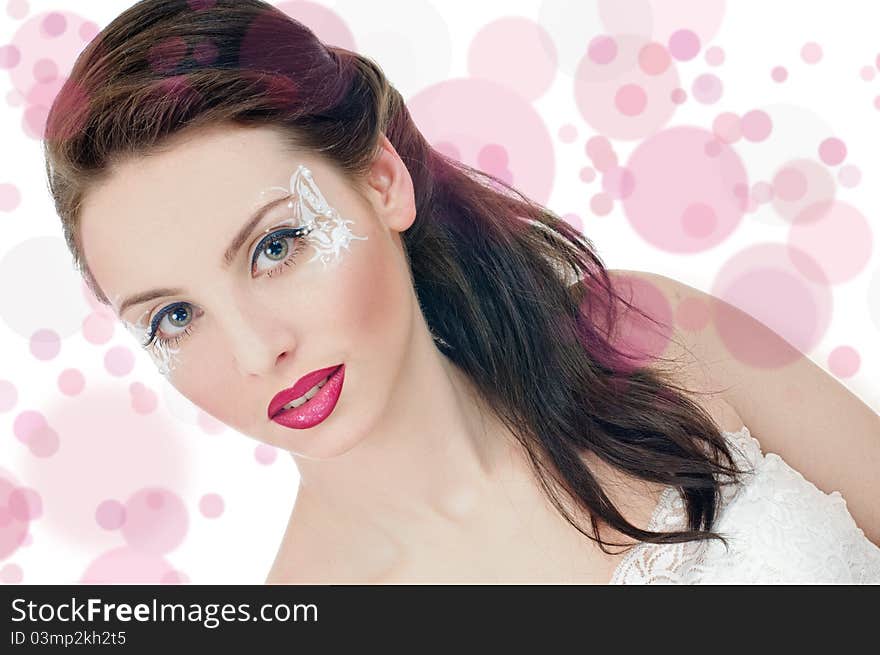 Portrait of beautiful girl with art make up on white. Portrait of beautiful girl with art make up on white