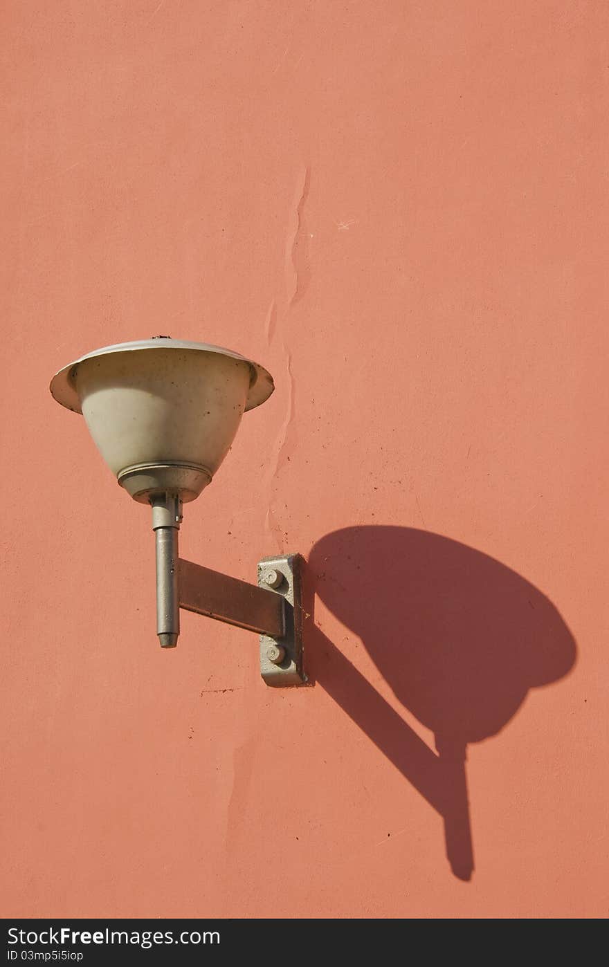 Grunge and vintage old town lamp and shadow