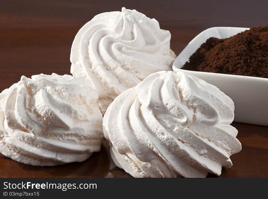 Meringues and coffee powder