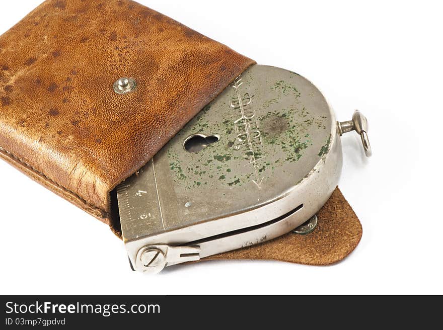 An old German military compass on white background