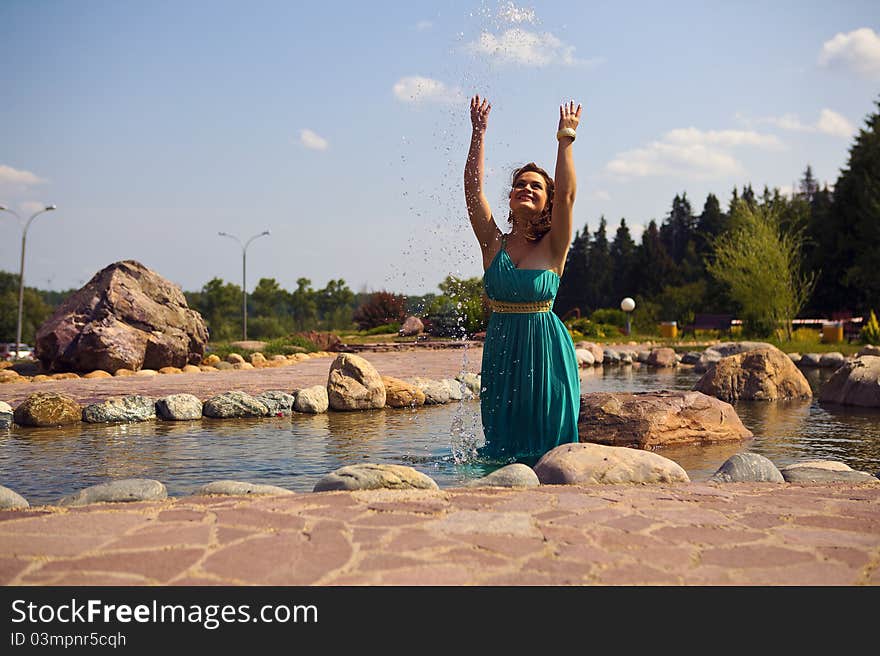 Extraordinarily beautiful girl in a blue dress