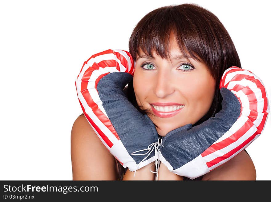 Young beautiful woman with hands in boxing gloves look like human heart on white. Young beautiful woman with hands in boxing gloves look like human heart on white