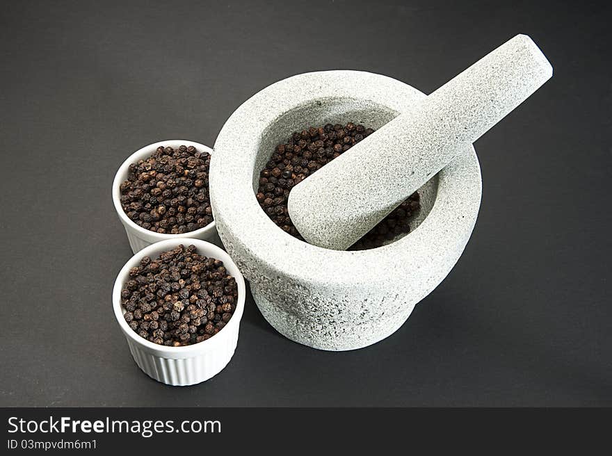 Pestle and Mortar with Black Pepper