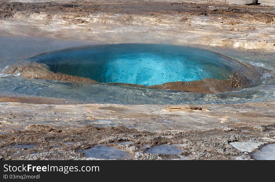 Eruption beginning of a geyser