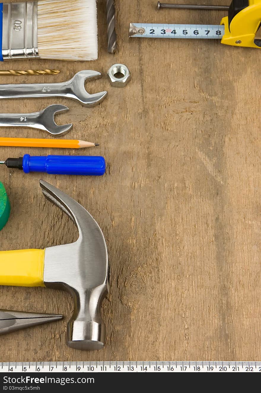 Tools and instruments on wooden board