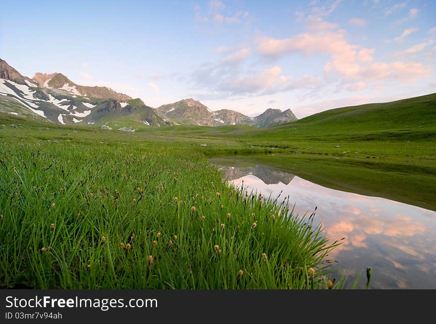 A sunrise over caucasus mountains