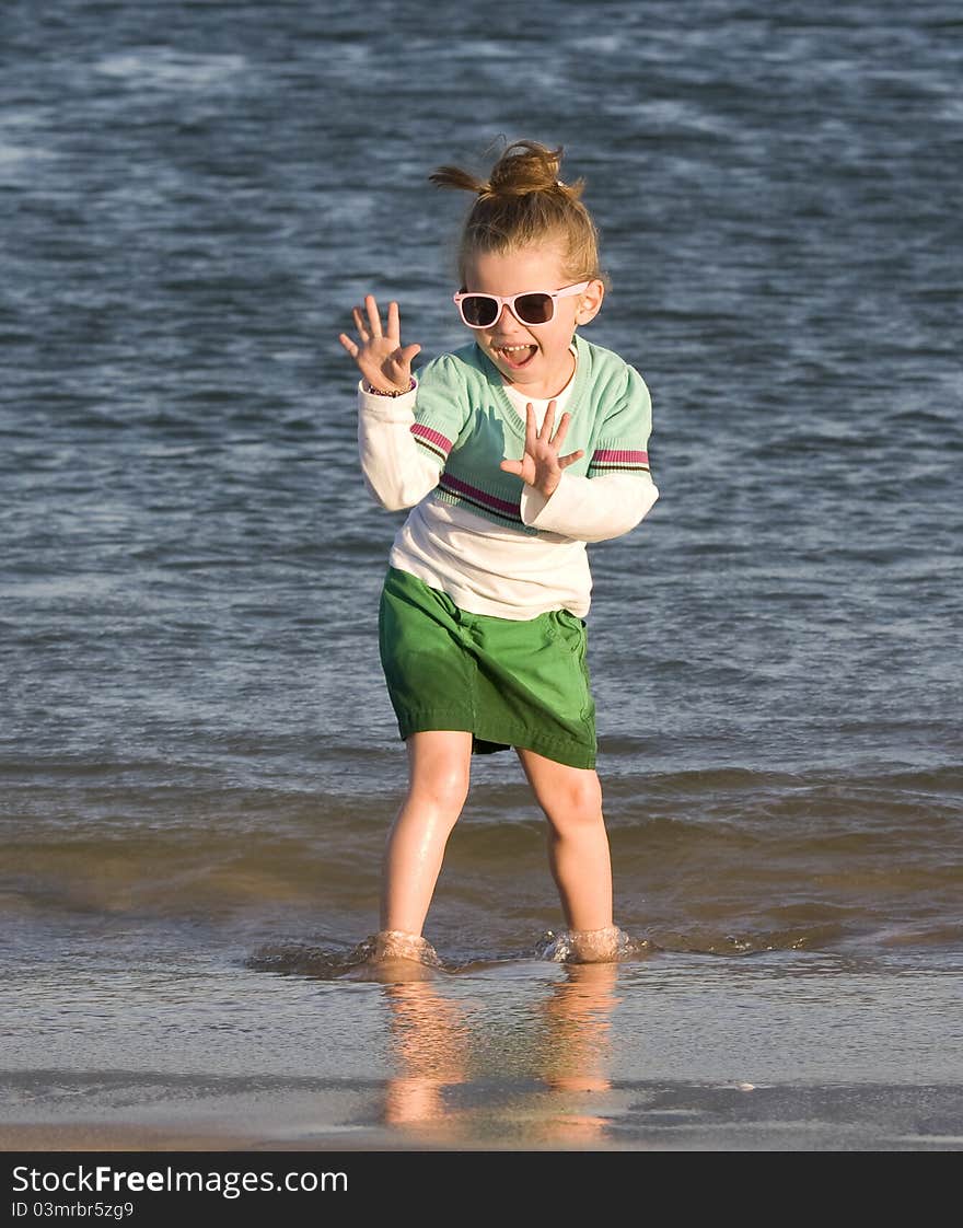 Posing in the sea with sumglasses. Posing in the sea with sumglasses