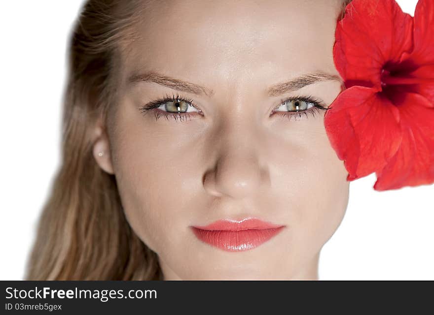 Portrait of beautiful blonde girl with red flower on a white background. Portrait of beautiful blonde girl with red flower on a white background