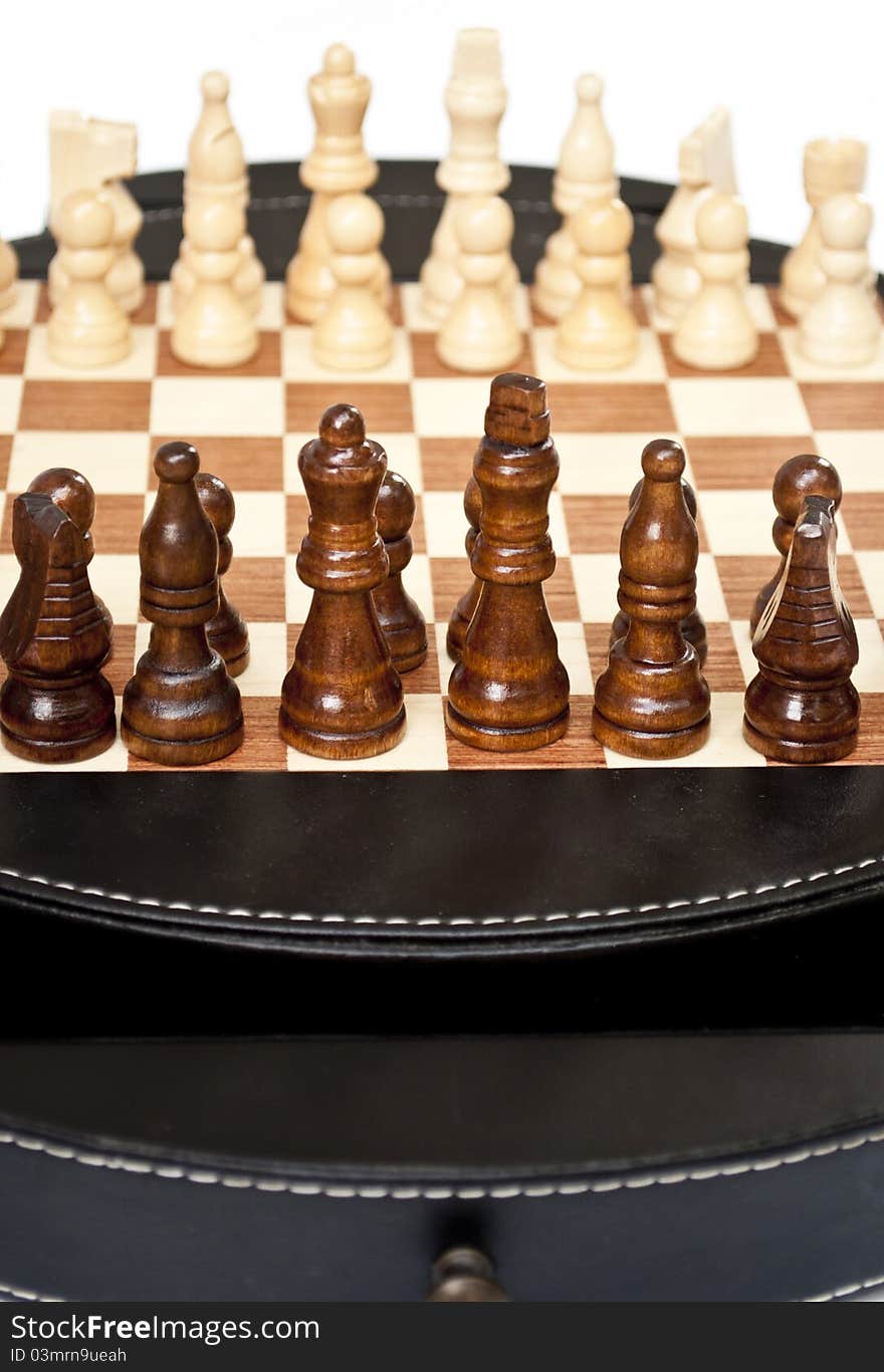 Chessboard isolated on white - closeup