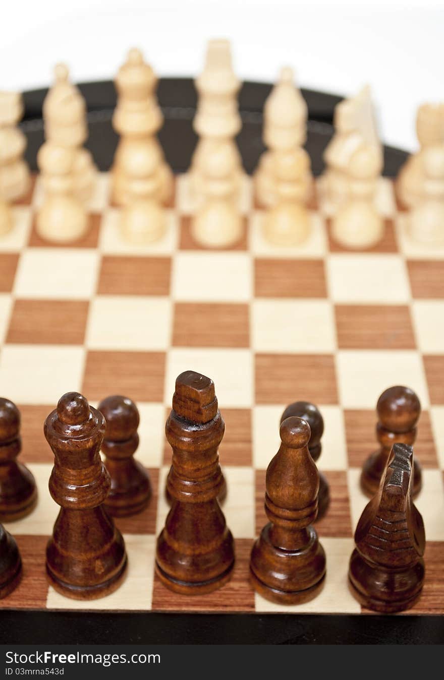 Chessboard isolated on white - closeup