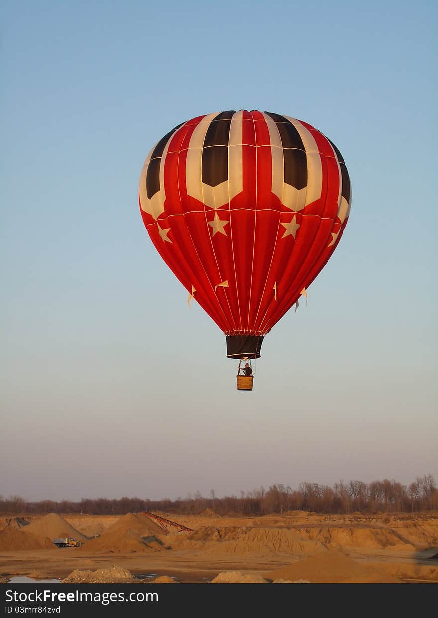 Balloon at sunset