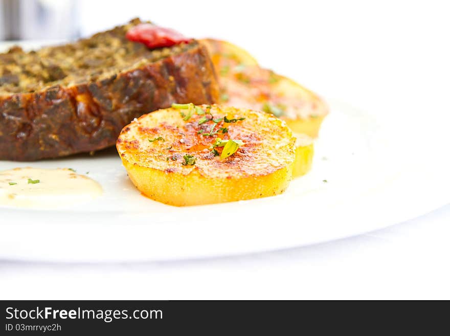 Detail of a traditional Romanian meal, minced veal with potatoes