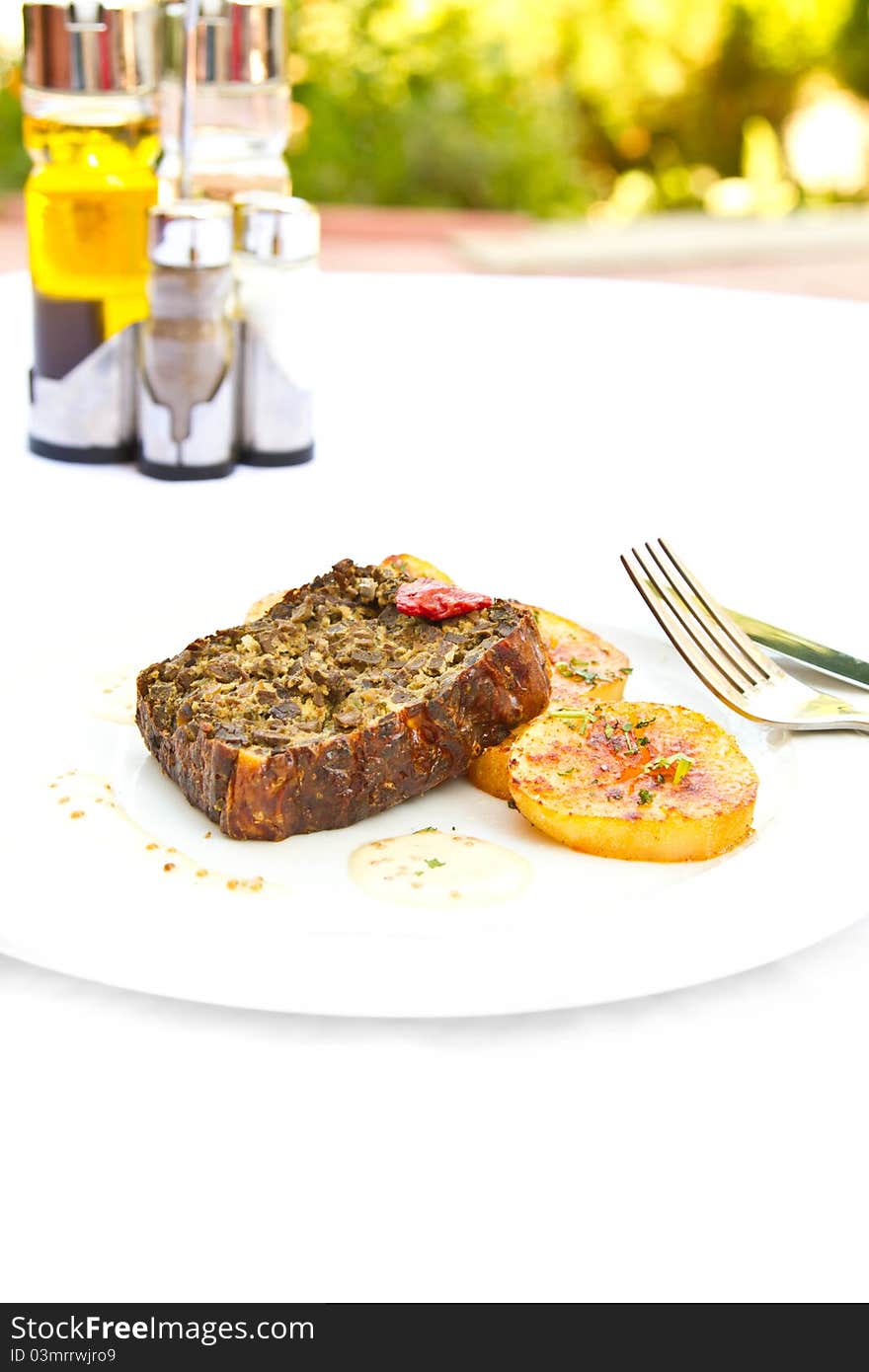 Detail of a traditional Romanian meal, minced veal with potatoes