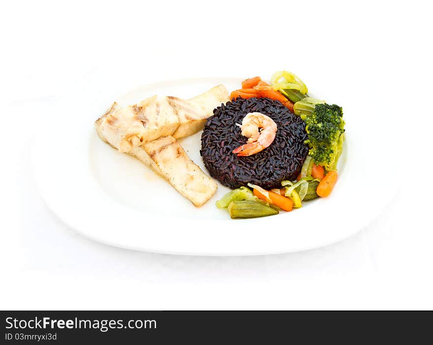 Fish with black rice, vegetables and prawn. Fish with black rice, vegetables and prawn