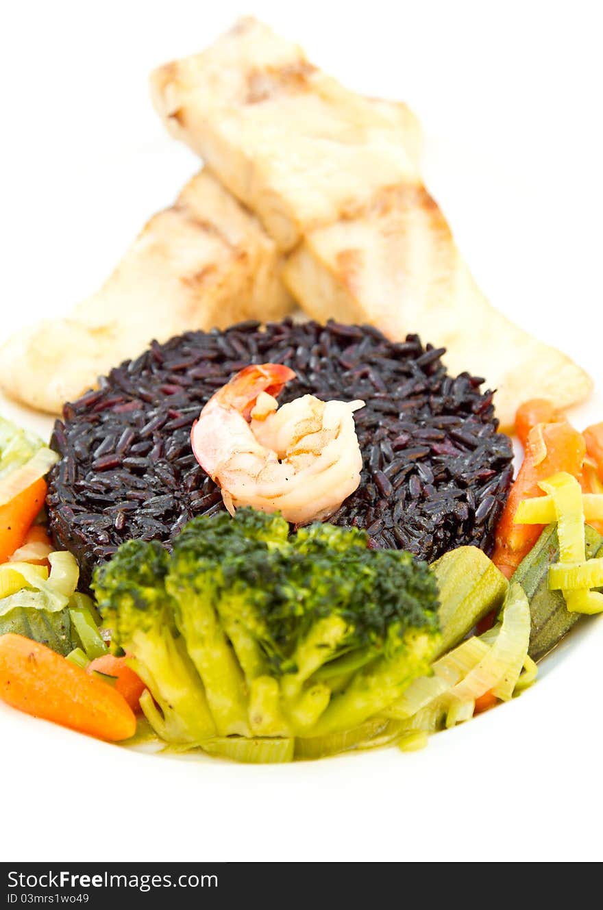 Fish with black rice, vegetables and prawn. Fish with black rice, vegetables and prawn