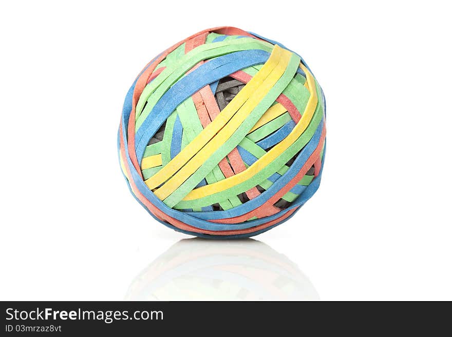 A colorful rubber band ball against a white background
