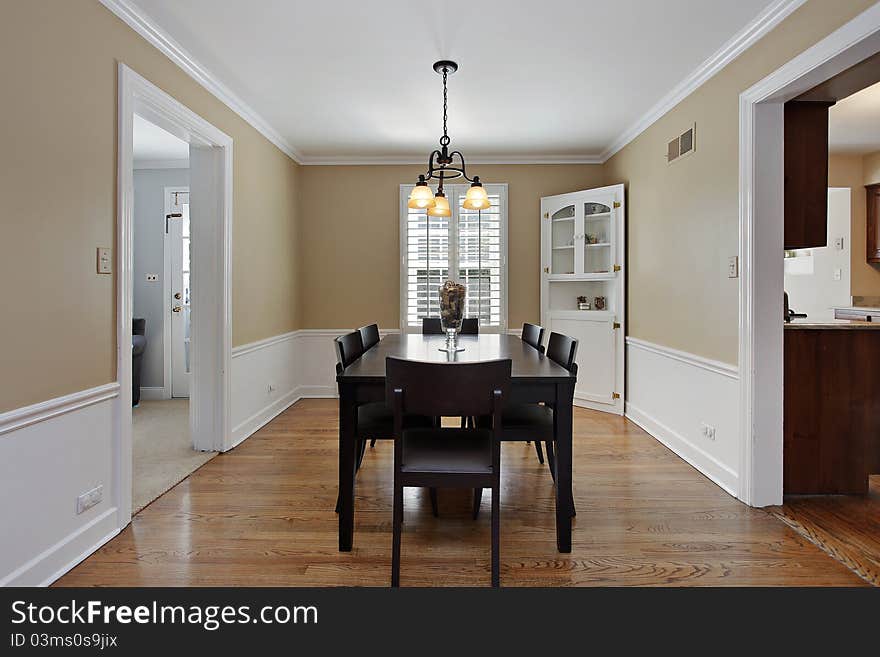 Dining room in suburban home with tan walls