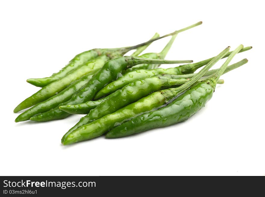 Fresh Green chilly close up isolated on white background