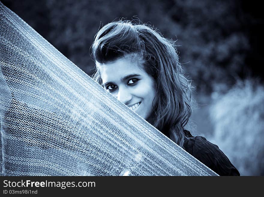 Indian model holding a traditional scarf in selenium tone. Indian model holding a traditional scarf in selenium tone