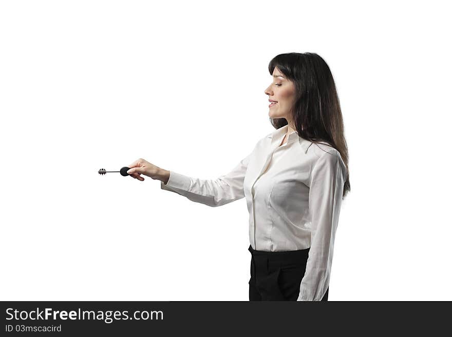 Smiling businesswoman holding a key. Smiling businesswoman holding a key