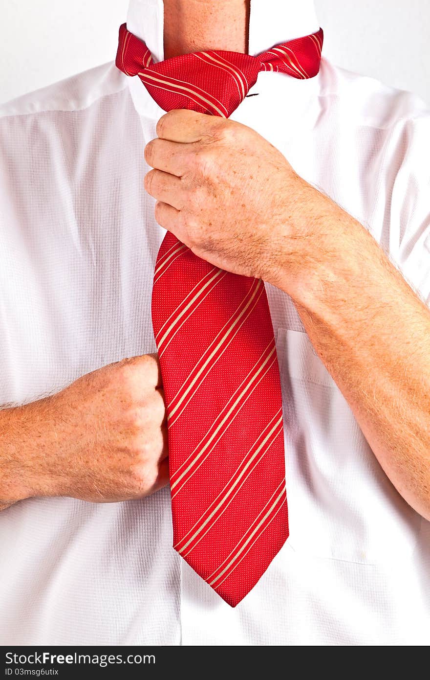 Man Binding His Tie